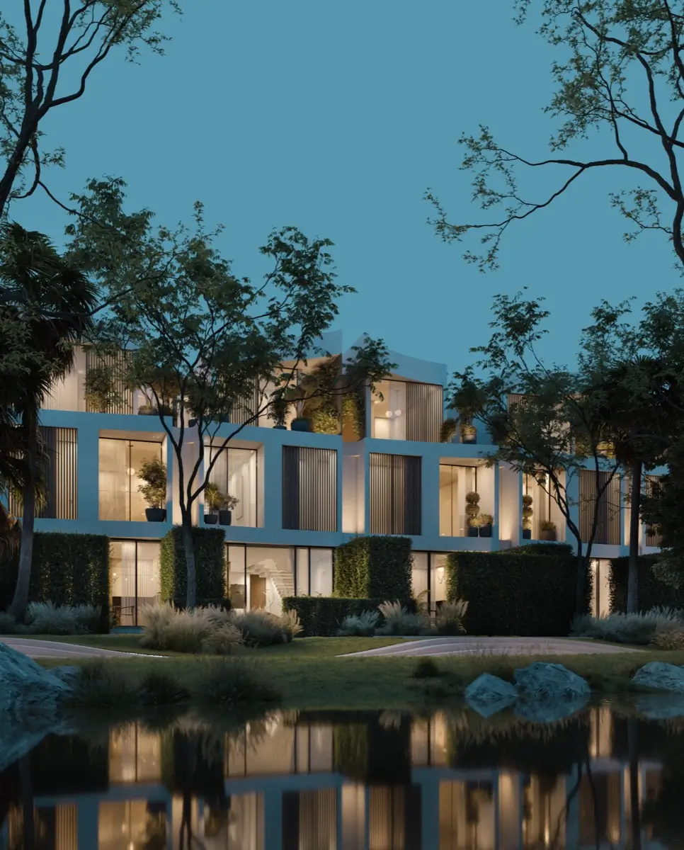 Villas reflected in still water at dusk
