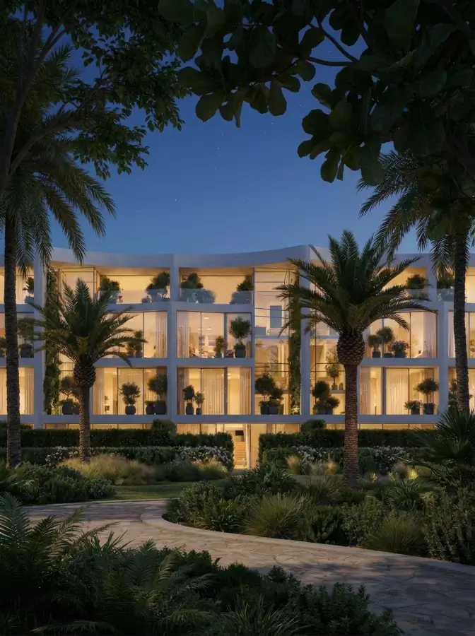 Villa at night with warm interior lighting